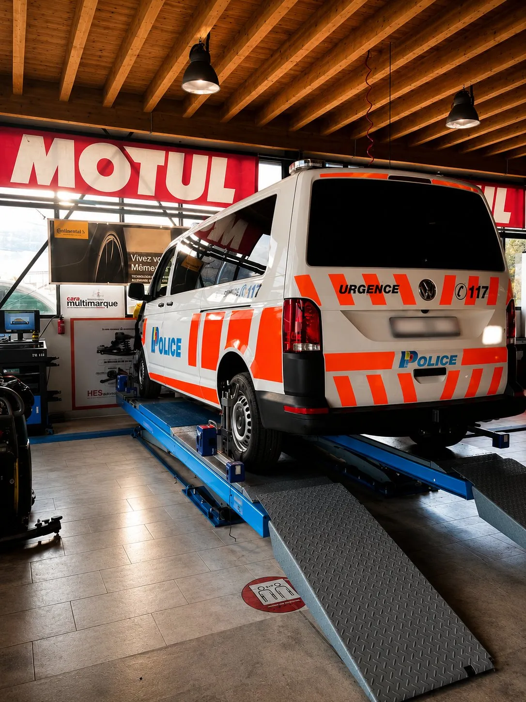 Réglage de géométrie sur banc dans l’atelier HES Automobile à Meyrin
